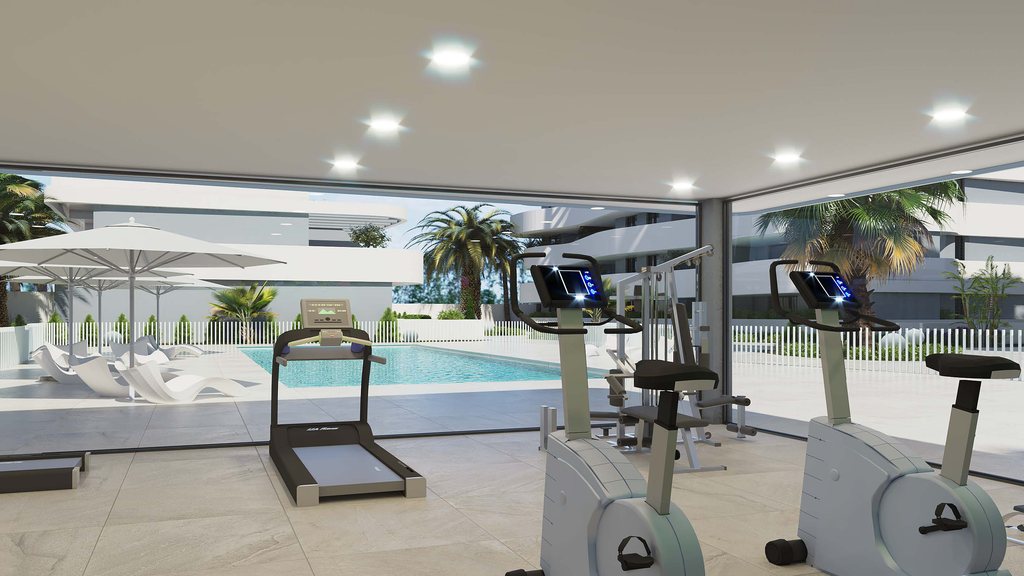 Gimnasio totalmente equipado en la urbanización con vistas a la piscina climatizada en SaliSol Resort, obra nueva en Guardamar del Segura