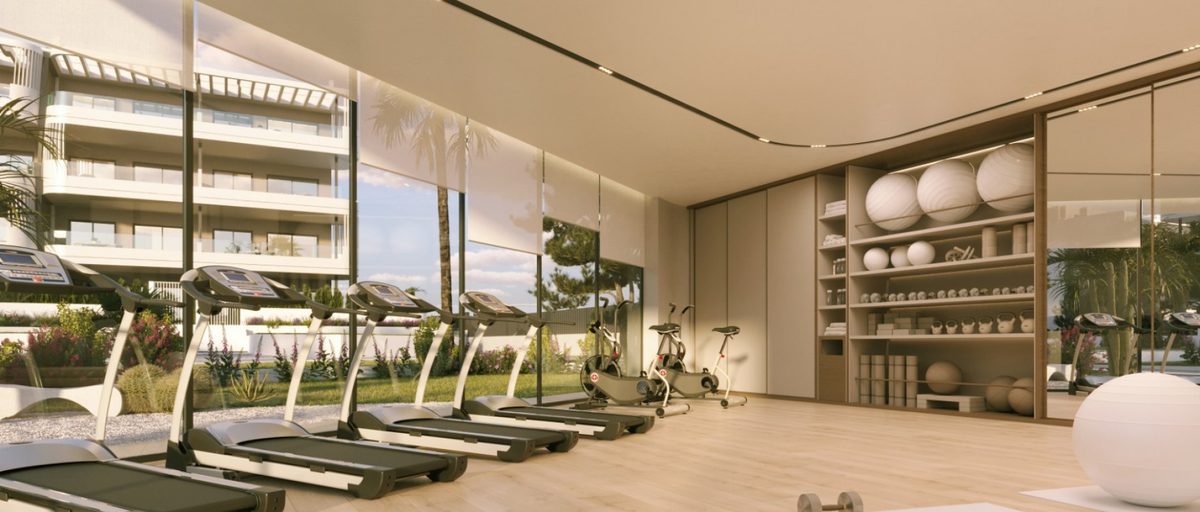 Gimnasio totalmente equipado en la urbanización de pisos de obra nueva Sunset Village en La Hoya, Torrevieja, Costa Blanca, Alicante