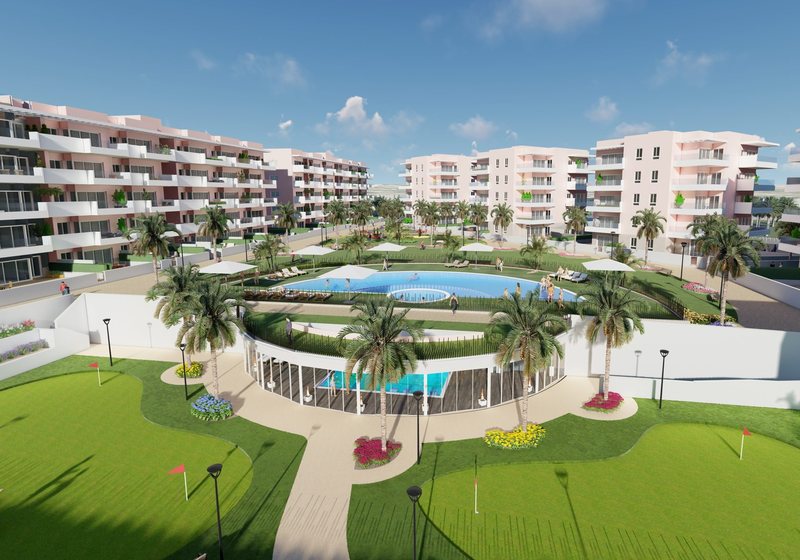 Vista aérea de Vista Azul con pisos de obra nueva, piscina y solariums en El Raso, Costa Blanca, España
