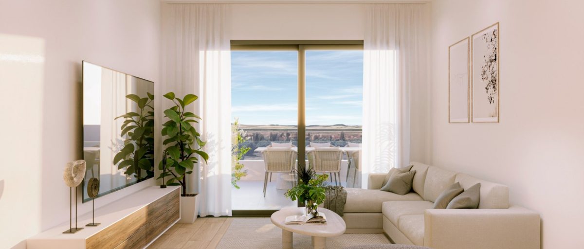 Bright open-plan living area with floor-to-ceiling windows in a Sunset Village new build apartment, Torrevieja, Costa Blanca